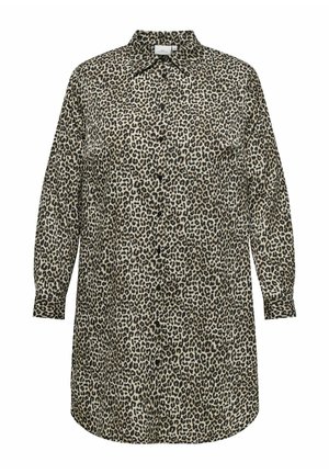 Chemise en imprimé léopard avec un col boutonné, des manches longues et une coupe ample. Fabriquée dans un tissu doux, elle présente un mélange de tons clairs et foncés.