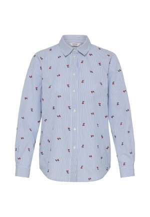 Chemise à rayures bleu et blanc avec des cerises rouges brodées. Comprend un col et des manches longues, fabriquée dans un tissu lisse.