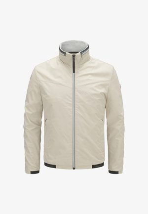 Hellbeige, leichte Jacke mit hohem Kragen, Frontreißverschluss, Seitentaschen und grauem Netzfutter, mit minimalistischem Design und dezentem Branding.