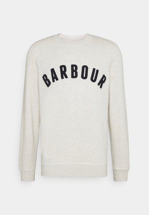 Jasnobeżowa bluza z długim rękawem i okrągłym dekoltem, z czarnym napisem „BARBOUR” łukowato nad piersią, ściągacze na rękawach i u dołu.