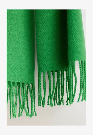 Zielony wełniany szalik o teksturowanej powierzchni, z frędzlami na brzegach i jednolitym kolorze. Lekki i miękki w dotyku.