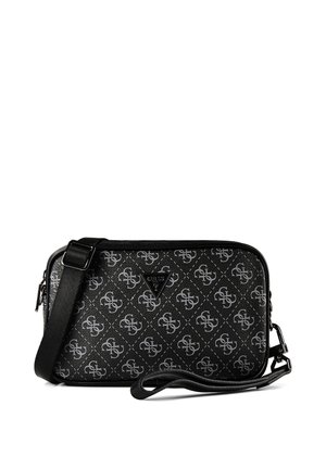 Black Guess crossbody bag with gray logo pattern, adjustable strap, and triangular brand emblem on front panel.