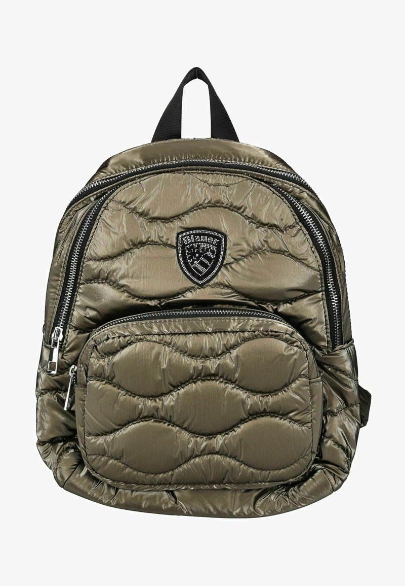 Sac à dos vert olive rembourré avec une texture matelassée, comportant deux compartiments zippés et un écusson de logo dans la partie supérieure.