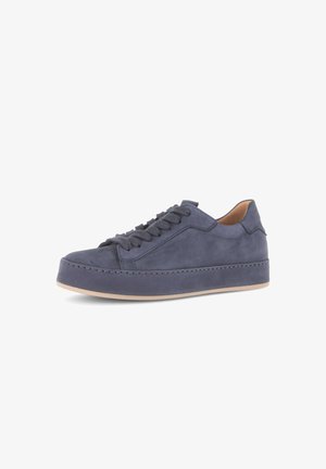 Navy blue suede low-top sneaker with matching laces, thick sole, visible stitching, and tan interior lining on white background.