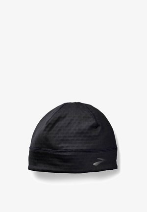 Casquette de course noire en tissu léger et texturé. Présente des coutures piquées et un accent logo réfléchissant. Forme arrondie avec un ajustement serré.
