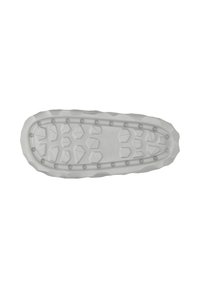 Shoe sole with a textured rubber surface in clear gray. Features hexagonal and circular tread patterns for enhanced grip and traction.
