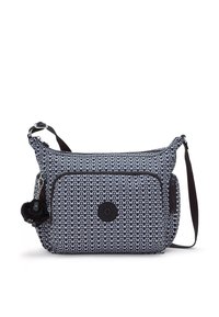 Textured crossbody bag in navy blue and white pattern, featuring a front zip pocket and a charm accent, with an adjustable strap.