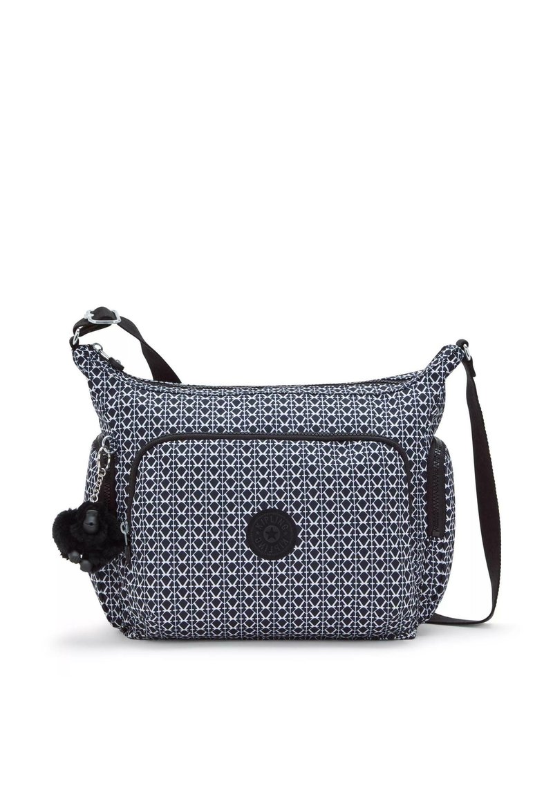 Textured crossbody bag in navy blue and white pattern, featuring a front zip pocket and a charm accent, with an adjustable strap.