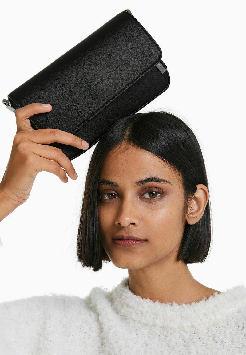 Bershka RIGID Across body bag black Zalando.ie