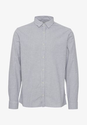 Rutet knappert skjorte i blått og hvitt. Har krage, lange ermer og rett kant. Laget av lettvektig stoff med en glatt tekstur.