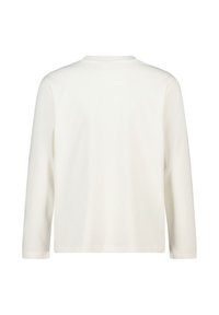 Pitkähihainen valkoinen t-paita, jossa on pyöreä kaula-aukko, näkyy takaa valkoista taustaa vasten.