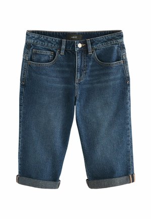 Pantaloni corti in denim blu scuro, con risvolti, cinque tasche e chiusura a bottone. Presentano una trama sottile con accenti di cucitura arancione.