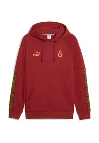 Rød hoodie med en kængurulomme. Har orange logoer og mønstrede detaljer på ærmerne. Fremstillet af blødt, tekstureret stof.