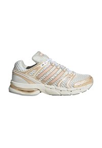 Weißer und beiger Sportschuh mit Mesh-Obermaterial, gepolsterter Sohle, mehreren Seitenstreifen und weißen Schnürsenkeln, gezeigt im Profil von der rechten Seite.