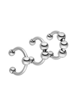 Silver metal ring featuring rounded balls and curved shapes, creating an interconnected design with a smooth, shiny texture.