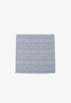 Blue paisley-patterned fabric placemat with a textured surface, featuring intricate floral designs in a lighter shade on top.