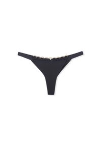 Bikini noir en string avec une texture lisse et de minces bretelles sur les côtés, présentant une rangée d'accents ronds dorés en haut.