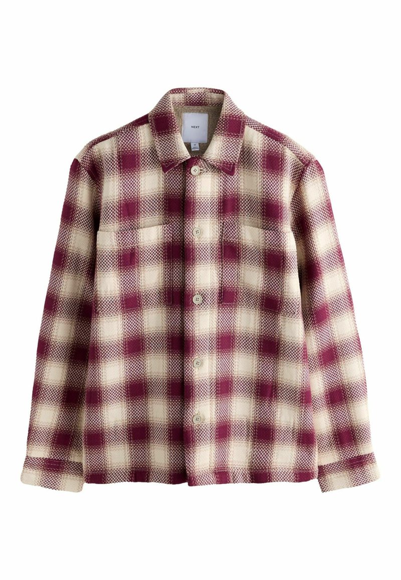Geruit overhemd met een bordeauxrood en crèmekleurig patroon, gemaakt van gestructureerde stof. Voorzien van een kraag, knoopsluiting aan de voorkant en twee borstzakken.