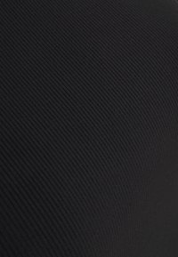 Casall CROP RACERBACK - Μπλούζα - black