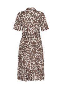 Brown dress with a white abstract pattern, short sleeves, collared neckline, and a fitted waist. Smooth fabric, knee-length design.