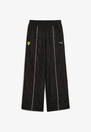 Juodi paminkštinti džinsiniai kelnaičiai su elastinga juosmens juostele, kurie turi baltas šonines juostas ir geltoną Ferrari logotipą kairėje šlaunyje.