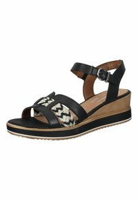 Sandale en cuir noir avec un design tressé, bout ouvert, bride de cheville réglable et une semelle compensée avec une semelle texturée et des accents contrastés.