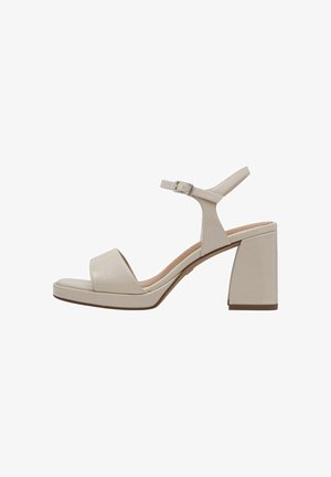 Beige højhælede sandaler med blokhæl, åben tå og ankelrem. Lavet af glat materiale med et minimalistisk design og subtil tekstur.