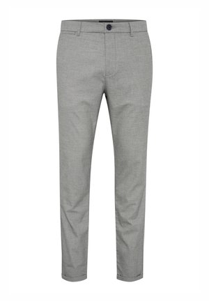 Pantalones grises de corte entallado, hechos de tela texturizada. Presentan un cierre frontal con botón y un diseño de pierna ajustada. Sin patrones ni acentos.