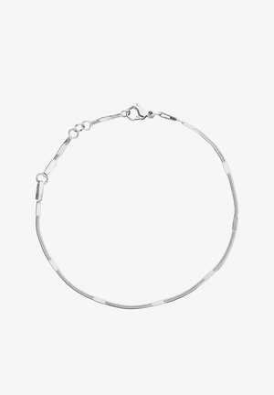 Bracelet délicat en chaîne d'argent avec fermoir mousqueton et maillons réglables, présenté en forme circulaire sur fond blanc.
