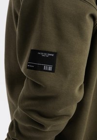 Ombre Felpa - dark olive