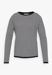 Maglione a maniche lunghe bianco e nero con un motivo geometrico, scollatura rotonda e bordi neri a contrasto.