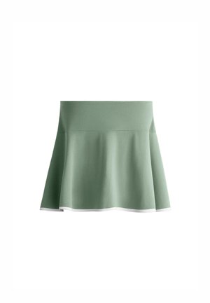 Groene, uitlopende rok van ademend materiaal, met een gladde textuur en een contrasterende witte zoom aan de onderkant. Eenvoudig, modern ontwerp.