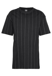 T-shirt noir à manches courtes, avec des rayures verticales blanches et un col rond. Fabriqué en coton doux.