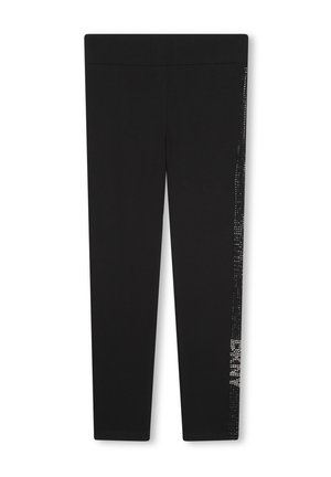 Leggings negros con una tela lisa y elástica. Presentan una línea vertical de adornos brillantes a lo largo del lado exterior.