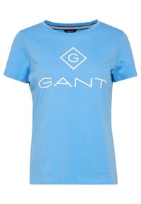 Blå bomullströja med rund halsringning, korta ärmar och en stor vit "GANT"-logotyp med en diamanter accent i mitten.