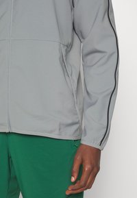 Nike Performance Sportovní bunda - grey