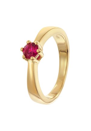 Gold ring featuring a round, faceted pink gemstone set in a six-prong setting; smooth band with a polished finish.