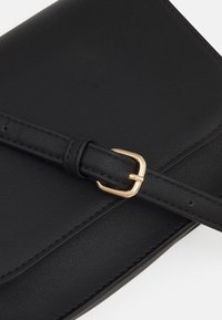 Even&Odd Torba čez telo - black