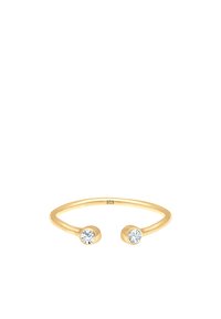 Anillo abierto chapado en oro que presenta dos piedras de strass redondas y transparentes, con un acabado suave y un diseño minimalista. Metal marcado como '925'.