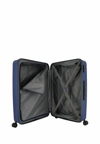 Valigia rigida blu con esterno texturizzato, scomparto con zip, interno grigio, cinghie regolabili e ruote scorrevoli lisce.