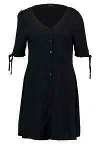 Abito nero con bottoni, maniche corte, scollatura a V, dettagli con lacci sulle maniche e una silhouette fluida. Tessuto liscio con una leggero lucido.