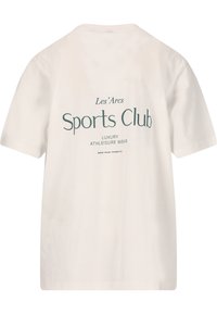 T-shirt en coton crème à manches courtes. Présente "Les’ Arcs Sports Club" imprimé en vert au dos. Texture lisse.