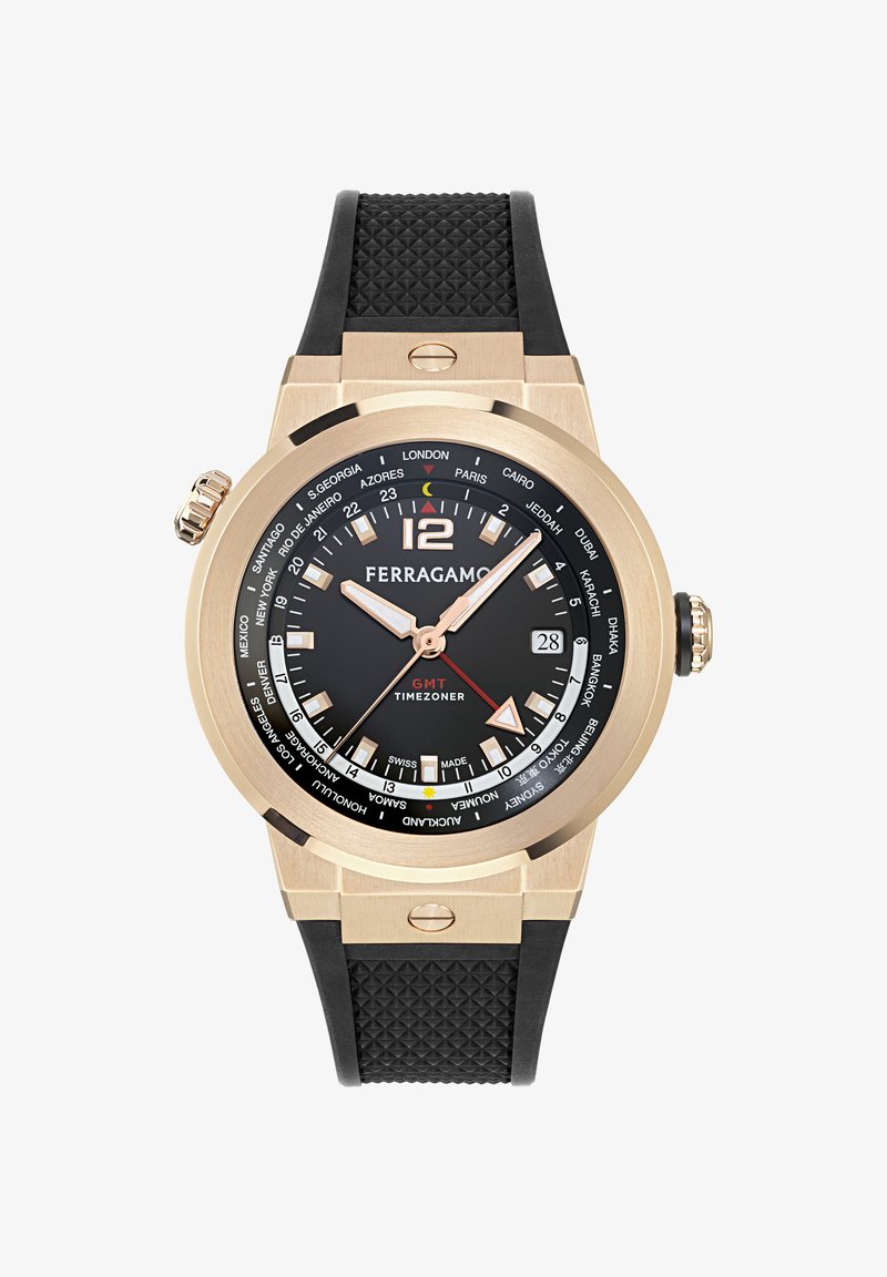 Ferragamo GMT Timezoner kellal on must kellanägu, kuldtoonist korpus, kummirihm ja maailma ajavööndite tähised ümber äärise.