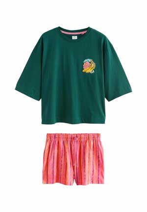 Dark green short-sleeve shirt with banana and flower graphic paired with pink and orange striped elastic waist shorts.