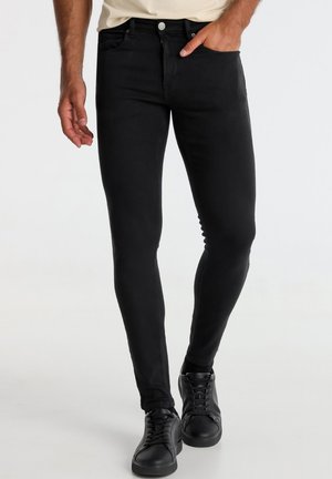 BI-STRETCH – MITTLERE AUFNAHME GRÖSSE IN ZOLL - Jeans Skinny - schwarz