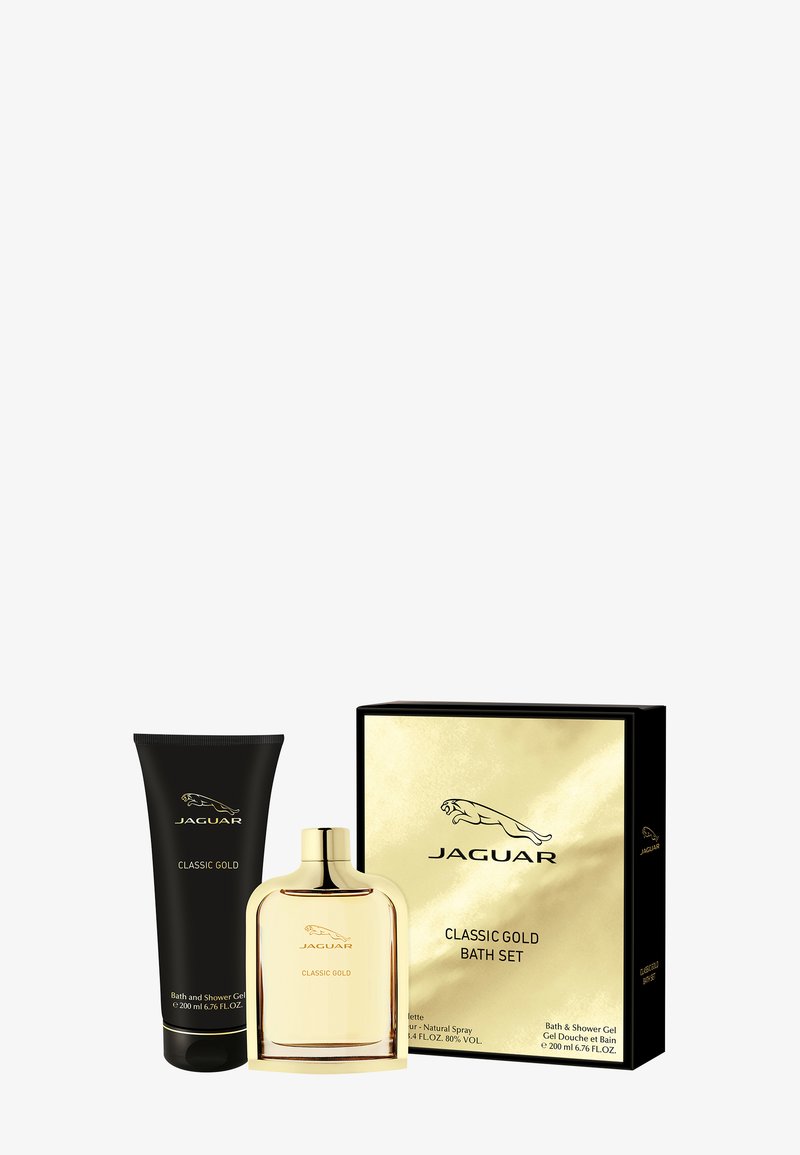 Il set da bagno Jaguar Classic Gold include una scatola dorata, un tubo nero di gel doccia e una bottiglia di profumo trasparente con un tappo dorato.