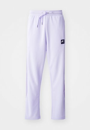 Light purple jogger pants made of soft fabric, featuring a drawstring waistband and a small black logo patch on the side.