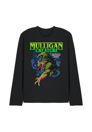 Black long-sleeve shirt with green text "Mulligan Creature" and a graphic of a green reptilian monster, with "Stranger Things" logo.