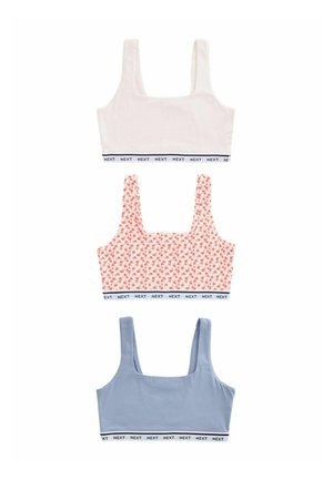 Drei bauchfreie Tops in Weiß, Floral-Pink und Staubblau mit gebrandeten elastischen Bändern am unteren Rand, flach auf einem weißen Hintergrund ausgelegt.