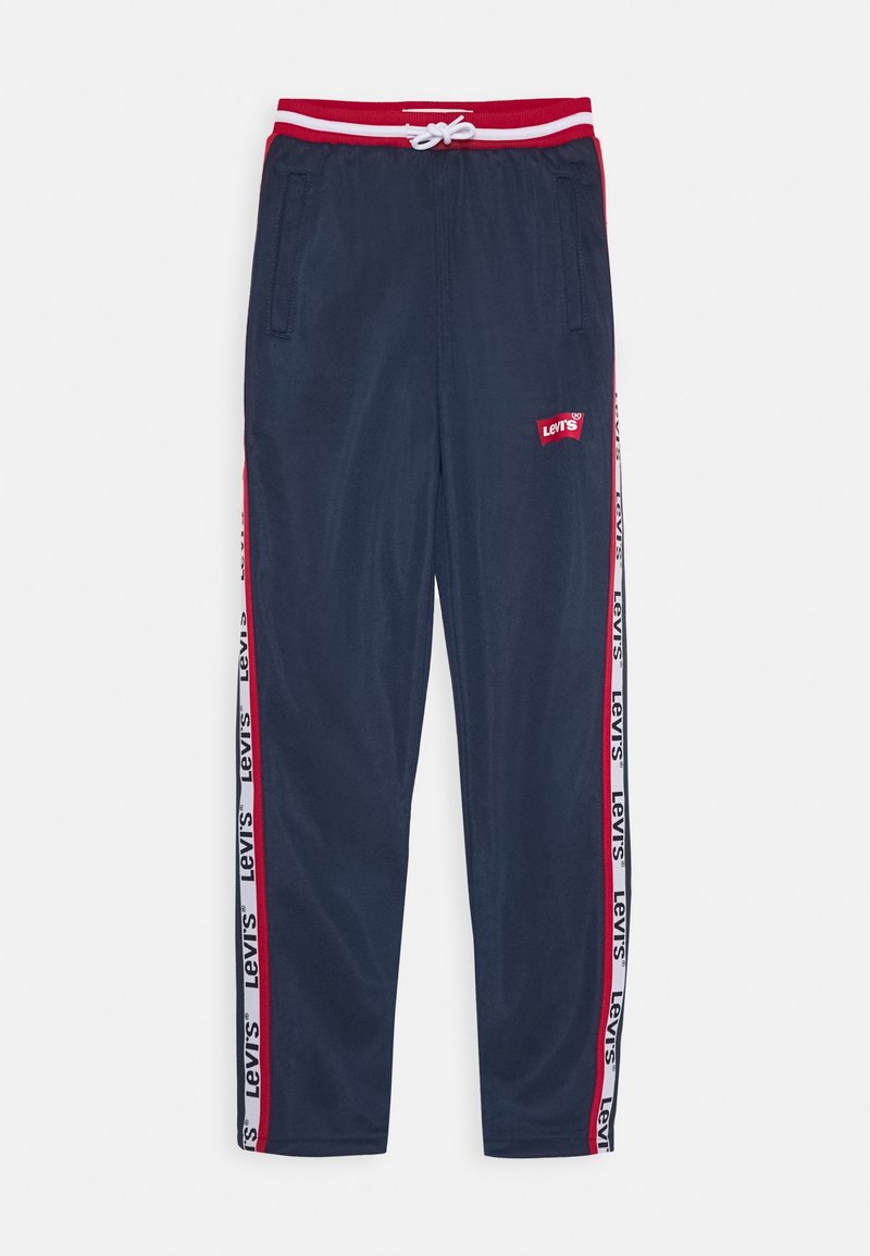 Navy Jogginghosen mit rotem elastischen Bund, weißem Kordelzug, Seitentaschen und roten Seitenstreifen mit wiederholtem "Levi's" Branding.